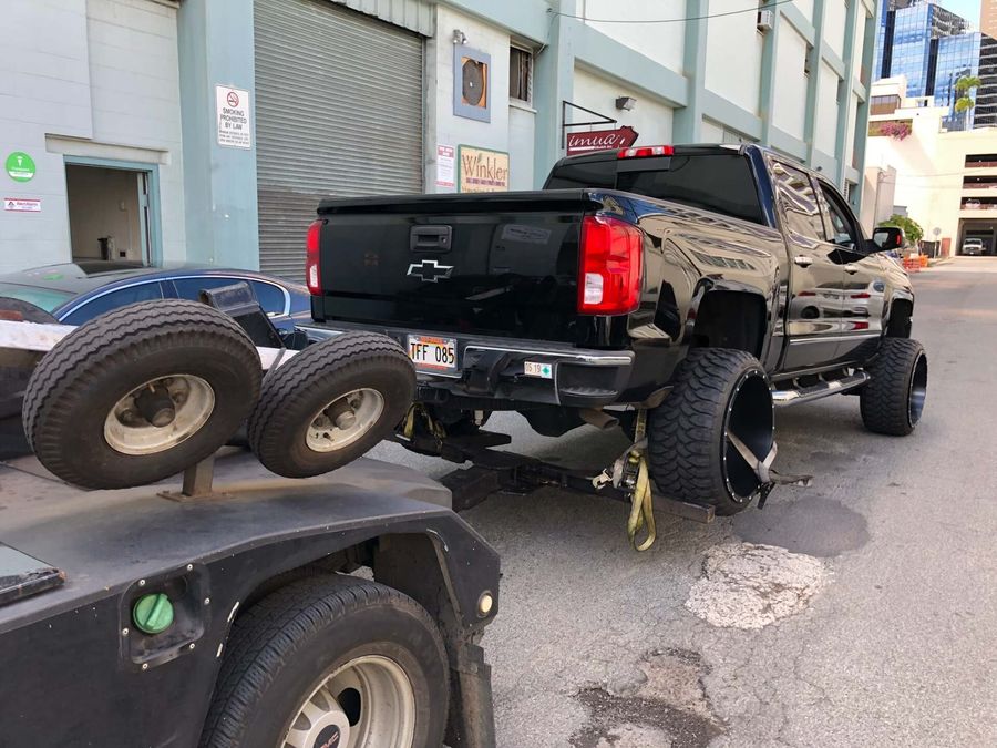 Black Tainted Car Towing — Honolulu, HI — Express Towing