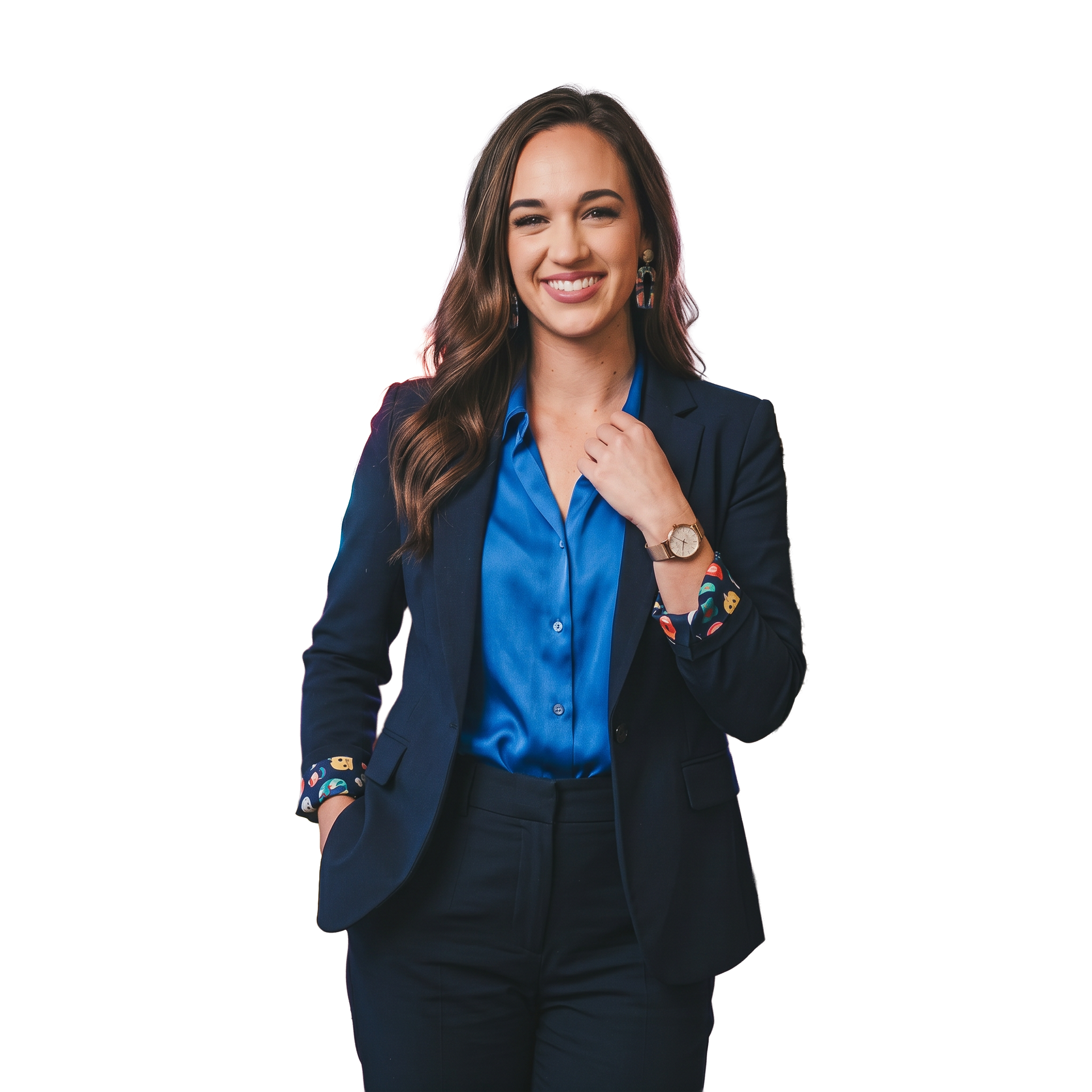 Smiling professional woman in navy blazer and blue blouse standing against a white background