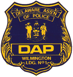 Blue and gold Delaware Association of Police badge with Wilmington Lodge No. 1 text