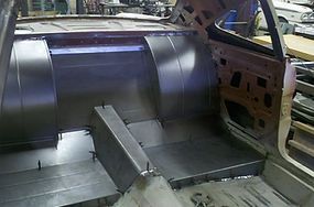 The inside of a car that is being built