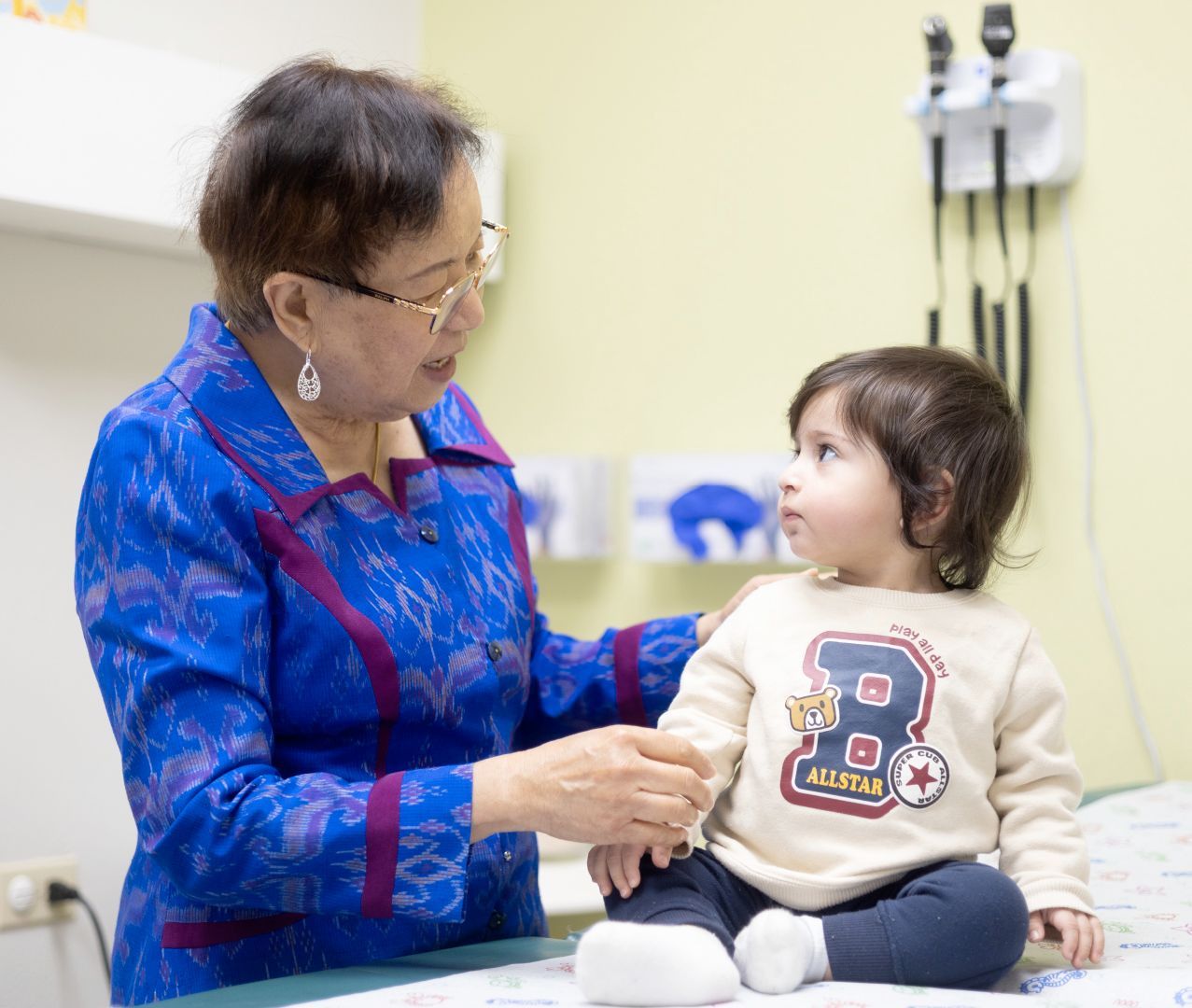 A doctor with a child patient
