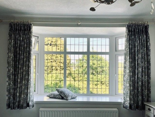 Triple pleat curtains