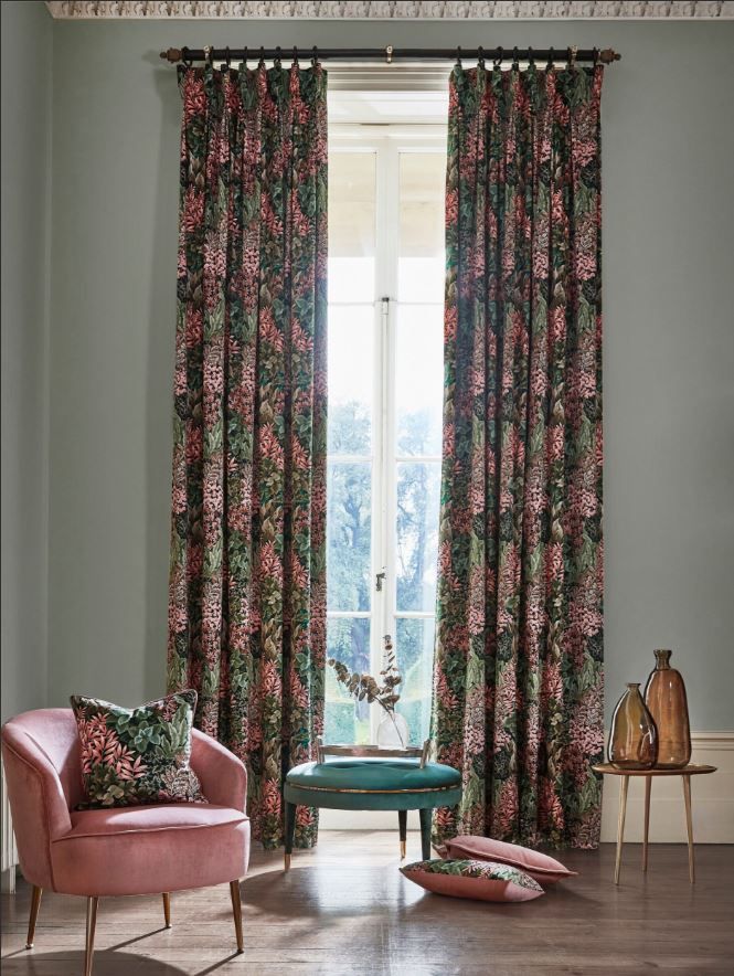A living room with curtains.