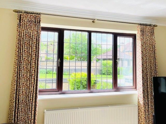 Interlined twin pleat curtains