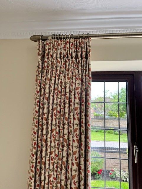 Interlined twin pleat curtains