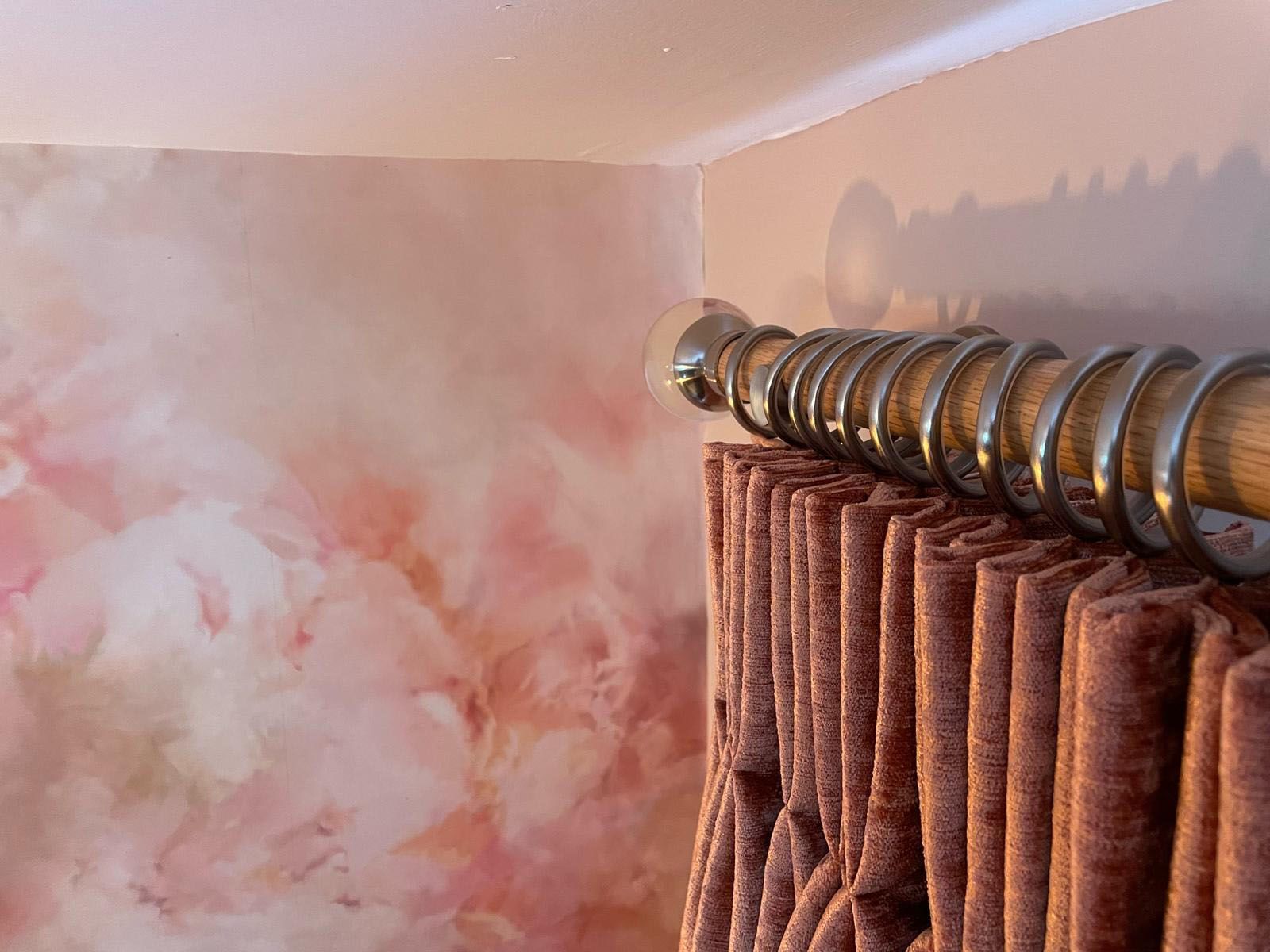 Twin pleat curtains on oak pole