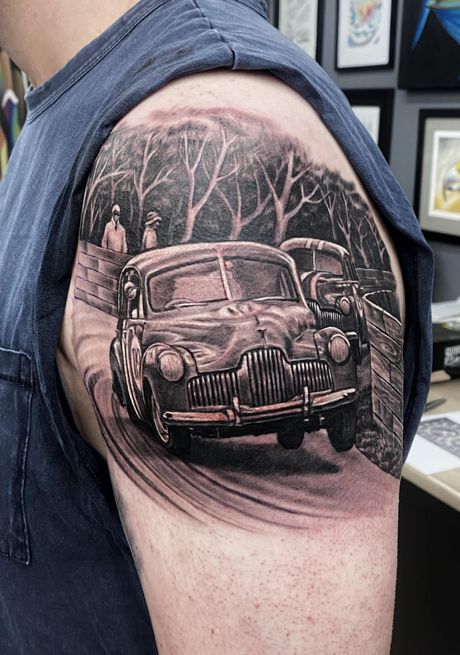 Black and Gray Tattoo on a Man's Shoulder of a Vintage Car — Whitsunday Tattooing Airlie Beach in Airlie Beach, QLD