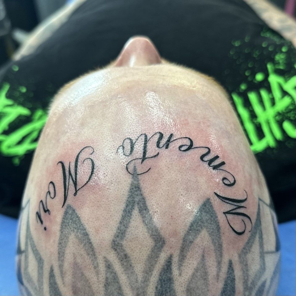 Tattoo on head: 