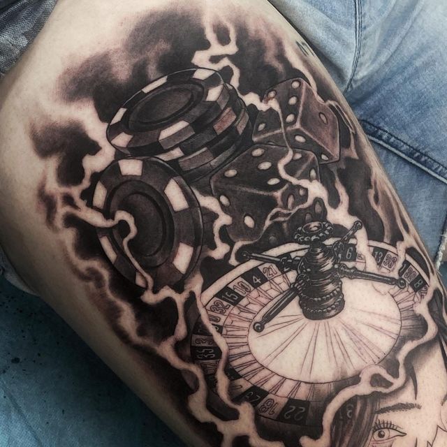 Roulette Wheel, Dice, and Poker Chips With Shadowy, Smoky Background — Whitsunday Tattooing Airlie Beach in Airlie Beach, QLD