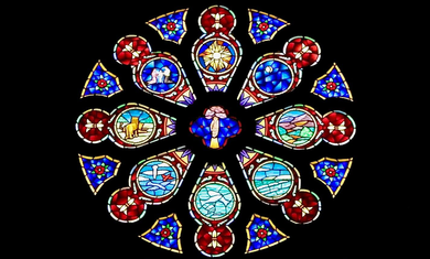Circular stained-glass rose window with blue, red, and gold sections on a black background