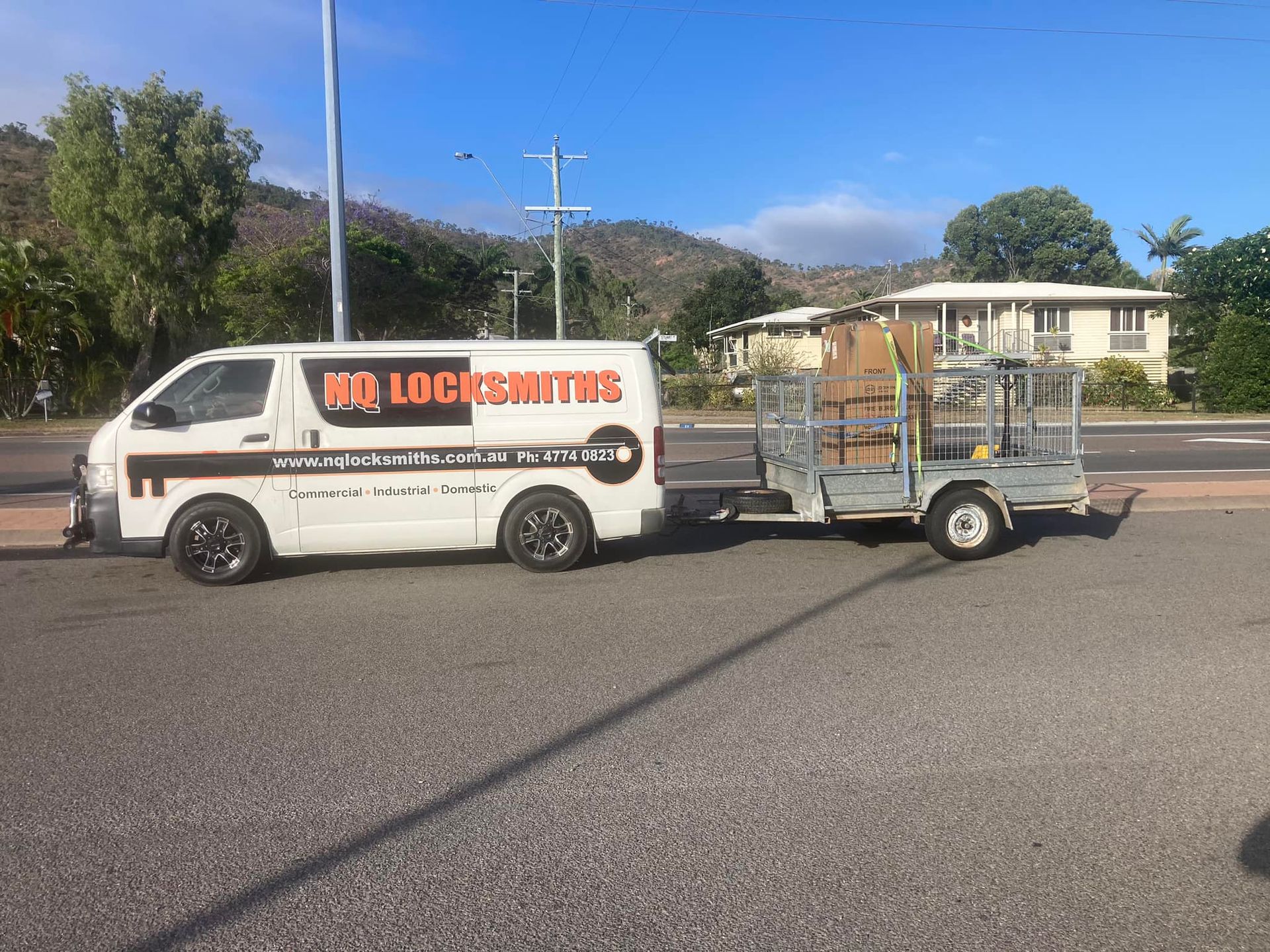 White Van Parked Outside a Building — Nq Locksmiths In Kirwan, QLD