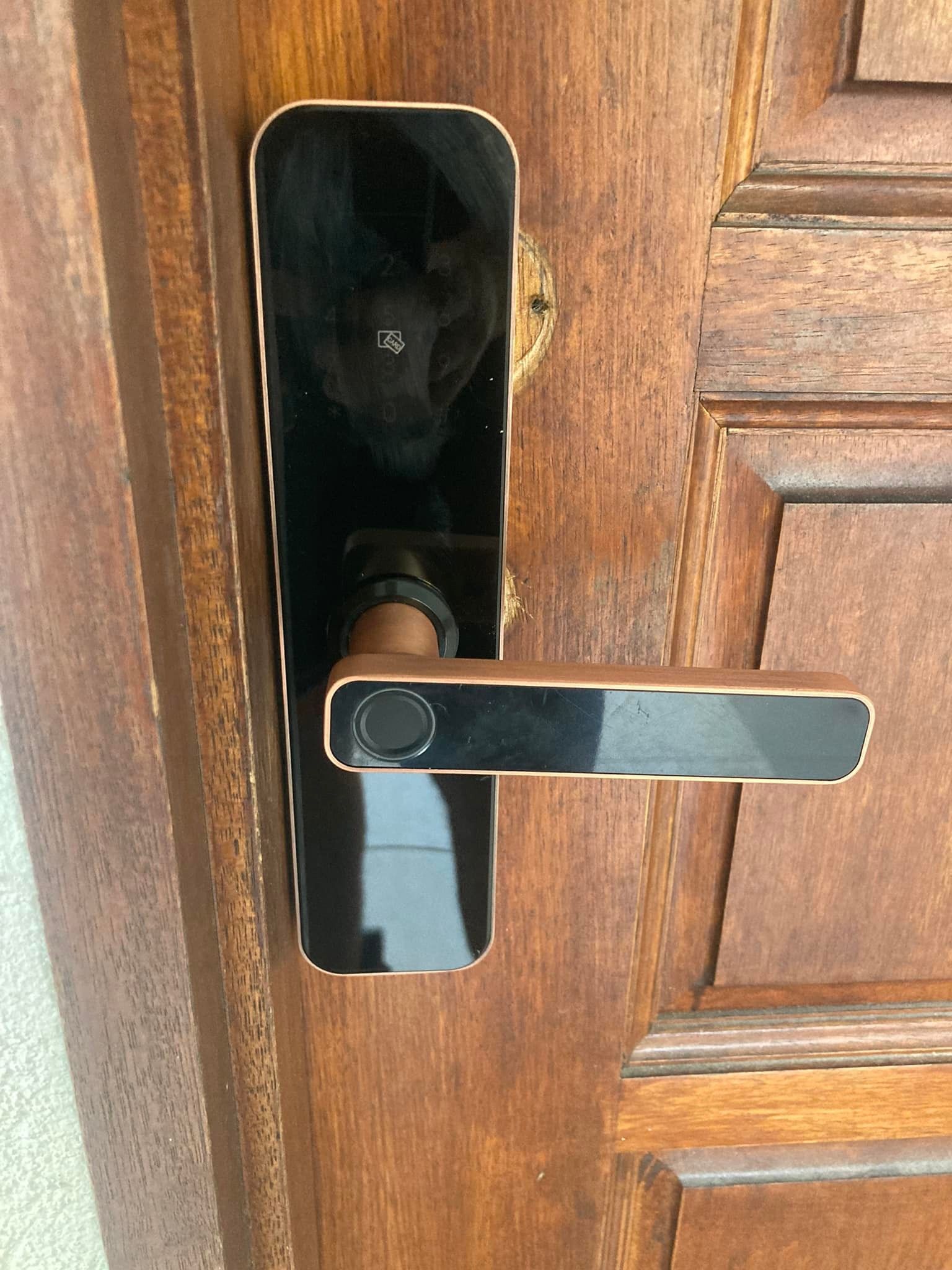 Smart Door Lock with Fingerprint Scanner on Wooden Door — Nq Locksmiths in Bowen, QLD
