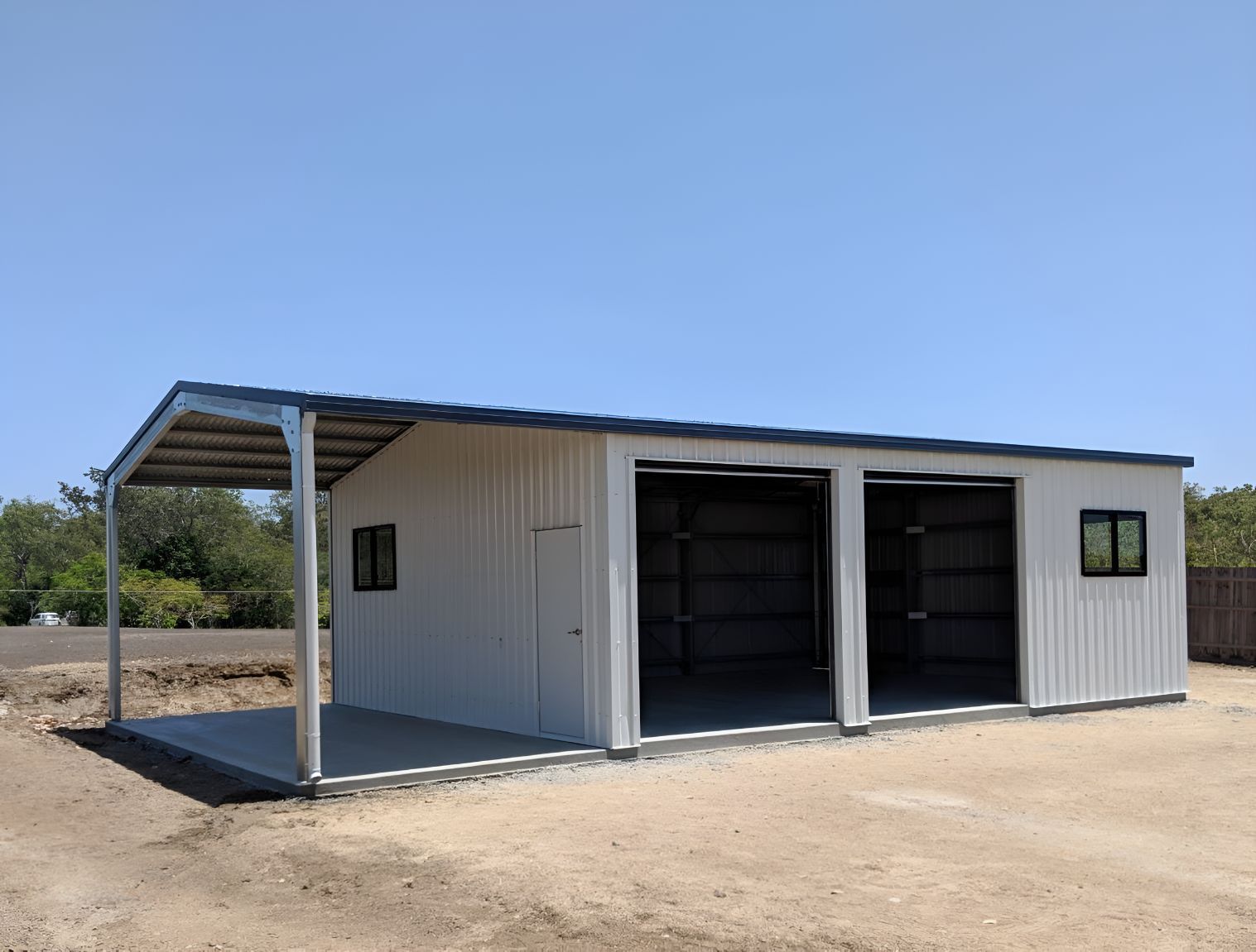 A Large White Building With a Canopy on Top of It — Mareeba Sheds & Gas In Mareeba, QLD