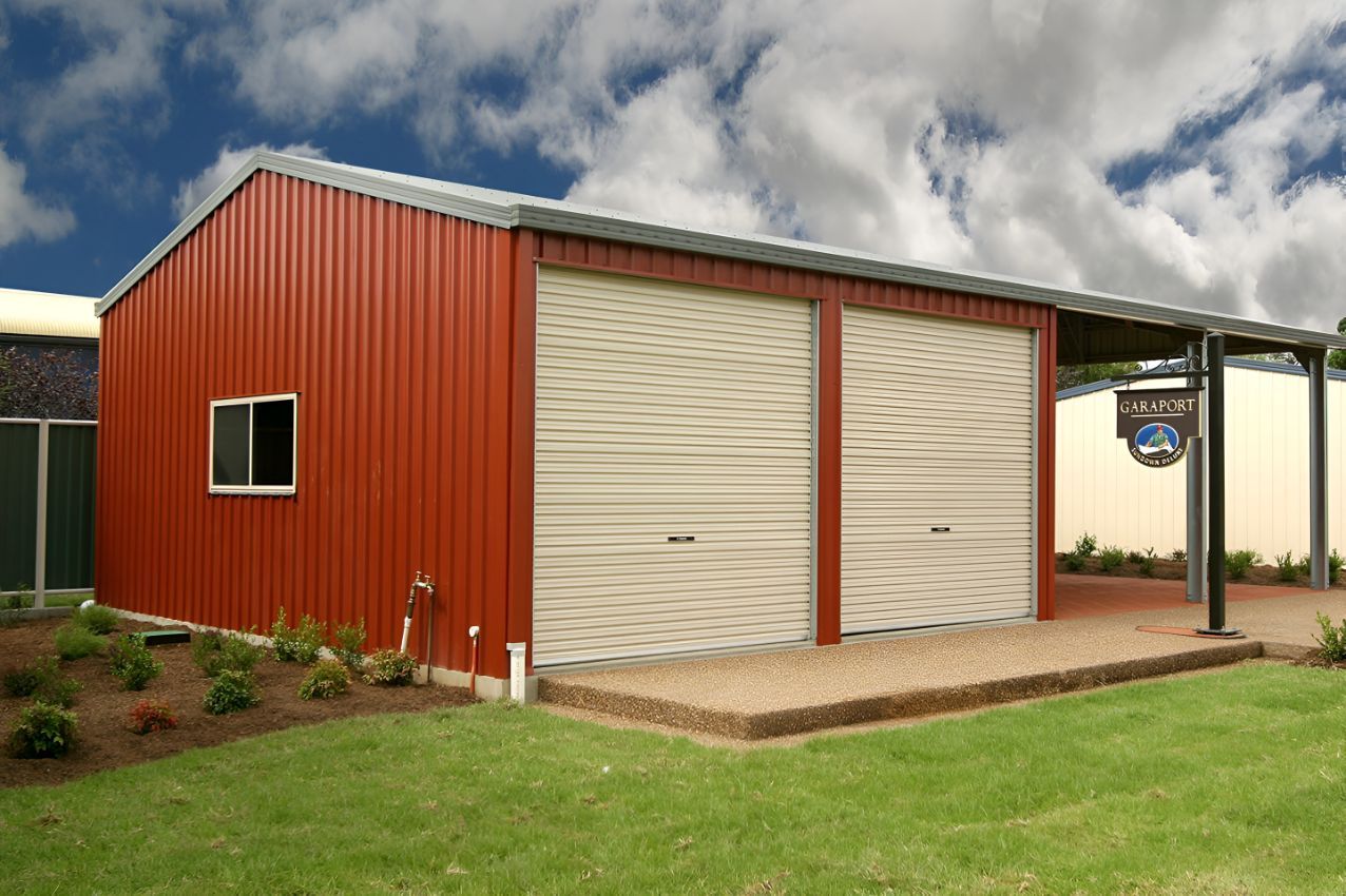 A Red Garage With White Garage Doors and a Pergola — Mareeba Sheds & Gas In Tablelands, QLD