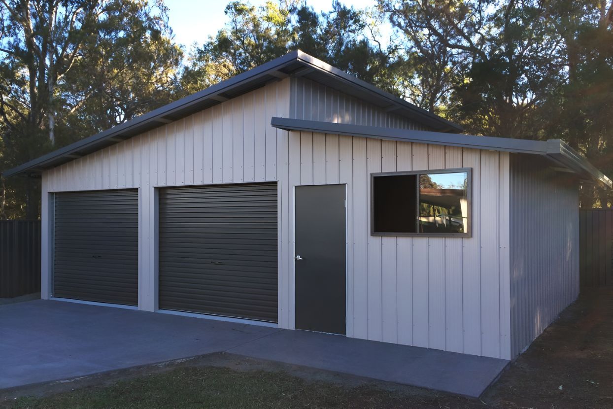 A Carport With a Red Roof and a Concrete Floor — Mareeba Sheds & Gas In Port Douglas, QLD