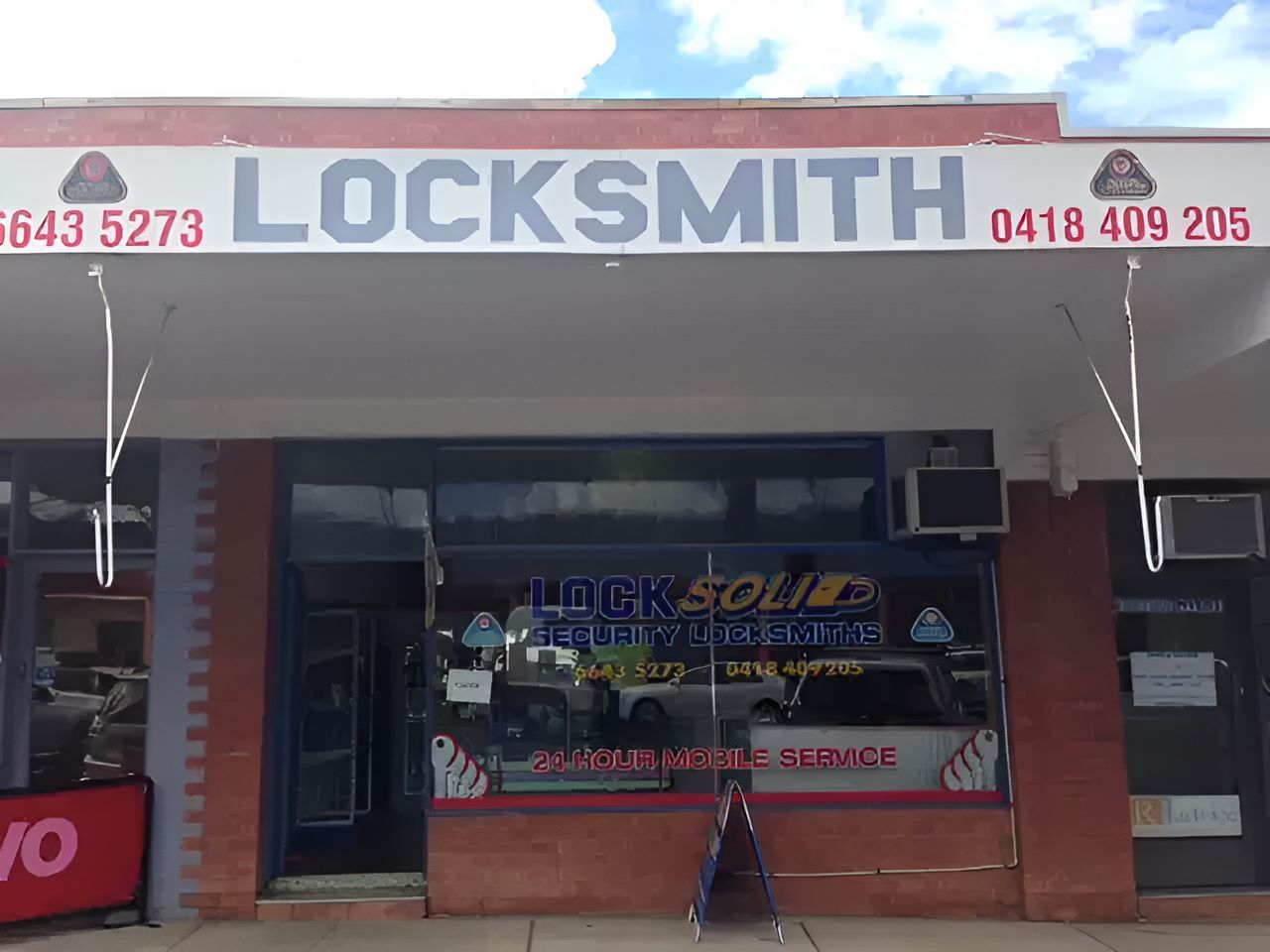 The Front Of A Locksmith Shop With A Sign That Says Locksmith On It — Locksolid Security Locksmiths in Grafton, NSW
