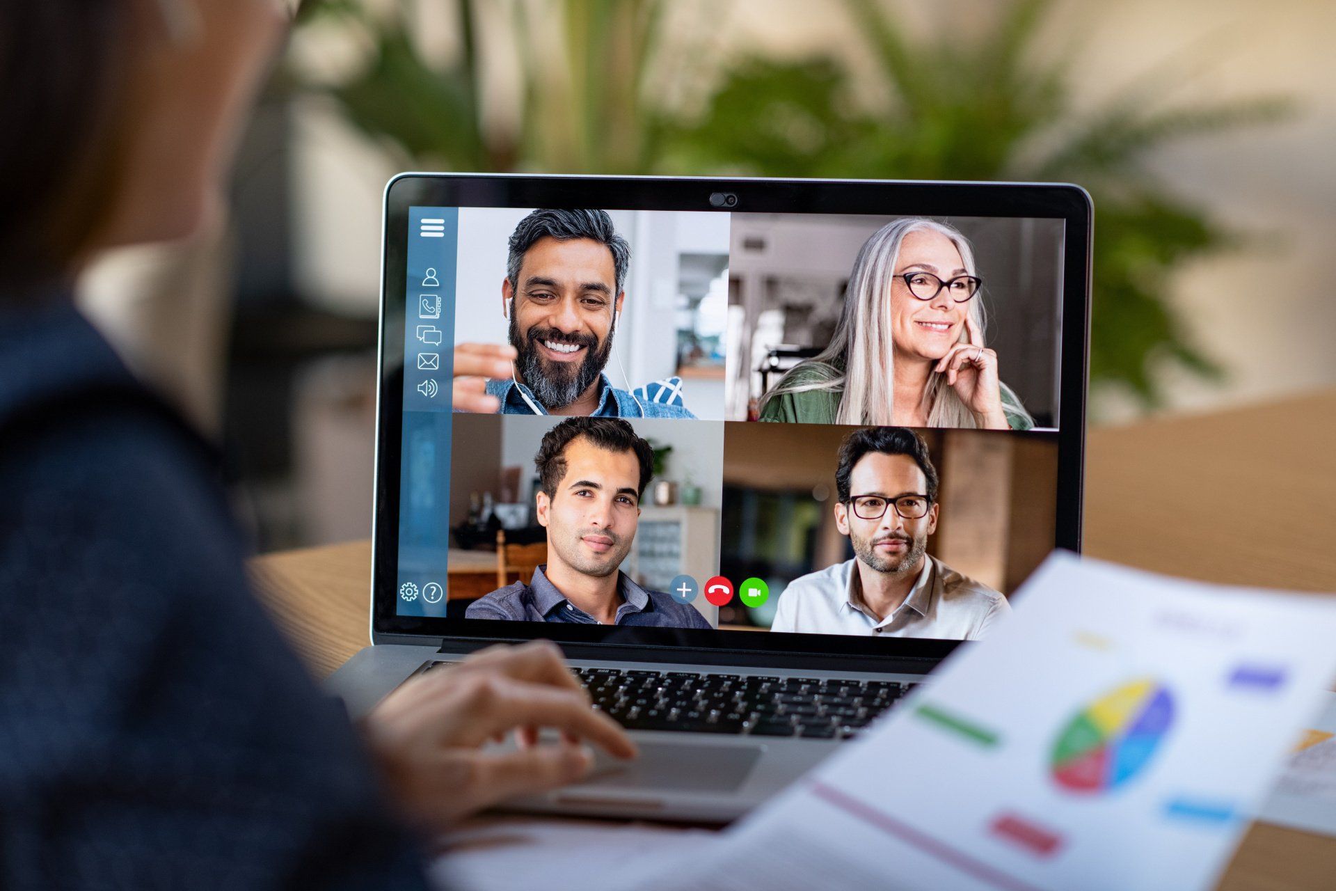 computer screen with split screen of different people