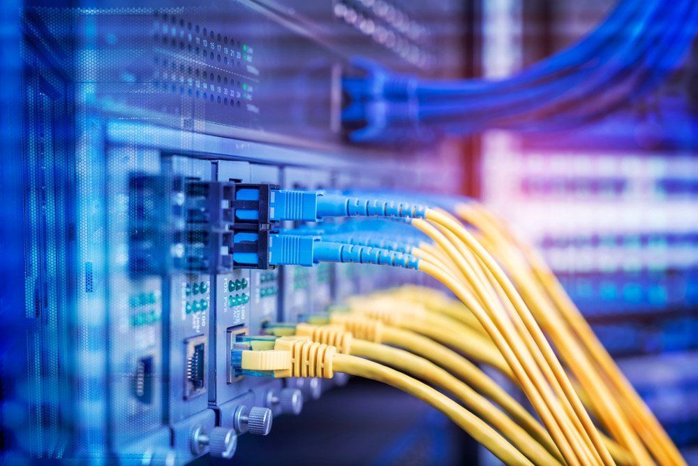 Network Server With Blue And Yellow Cables — Superior Wifi in East Ballina, NSW