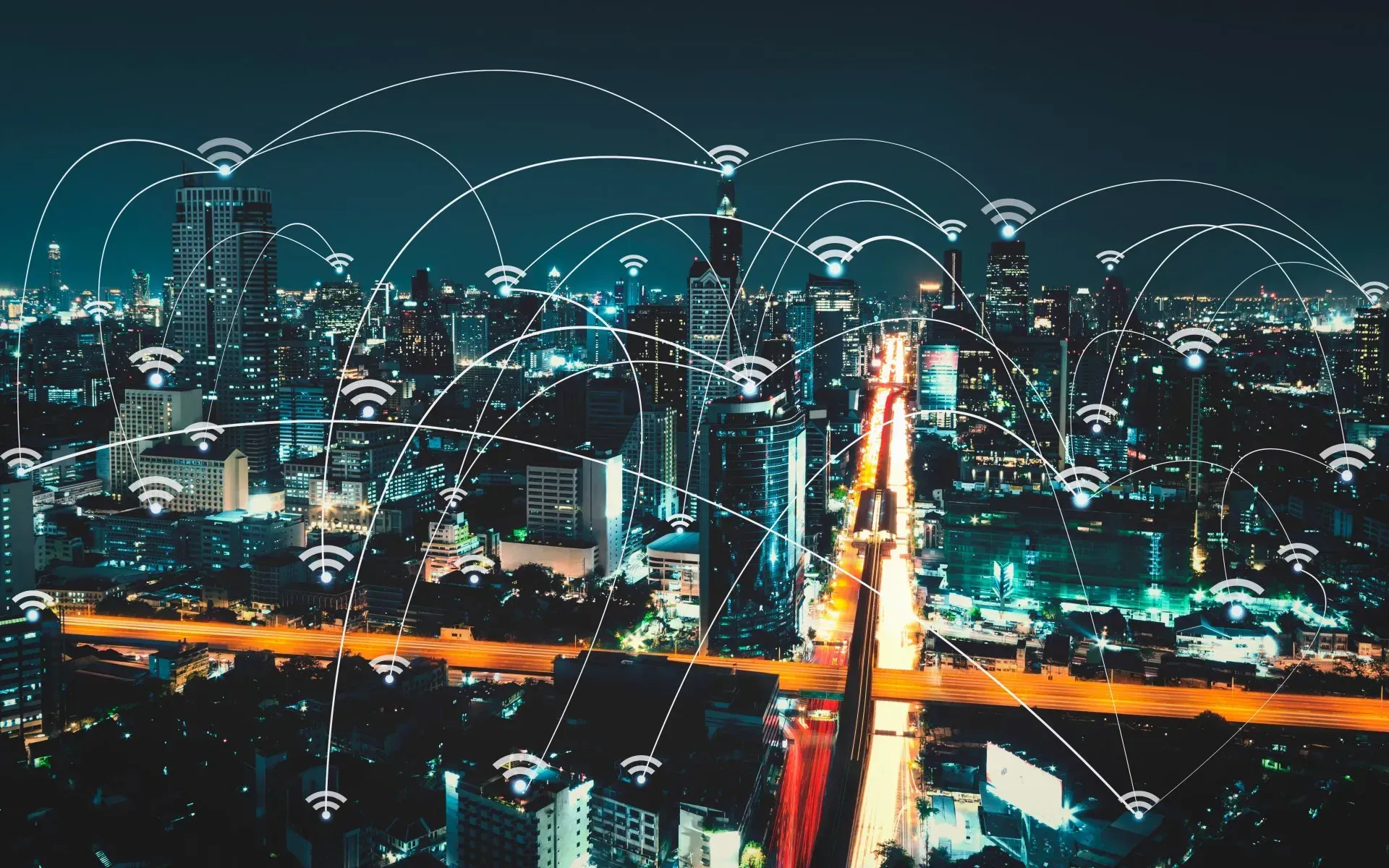 City Skyline At Night With Interconnected Wifi Icons — Superior Wifi in East Ballina, NSW