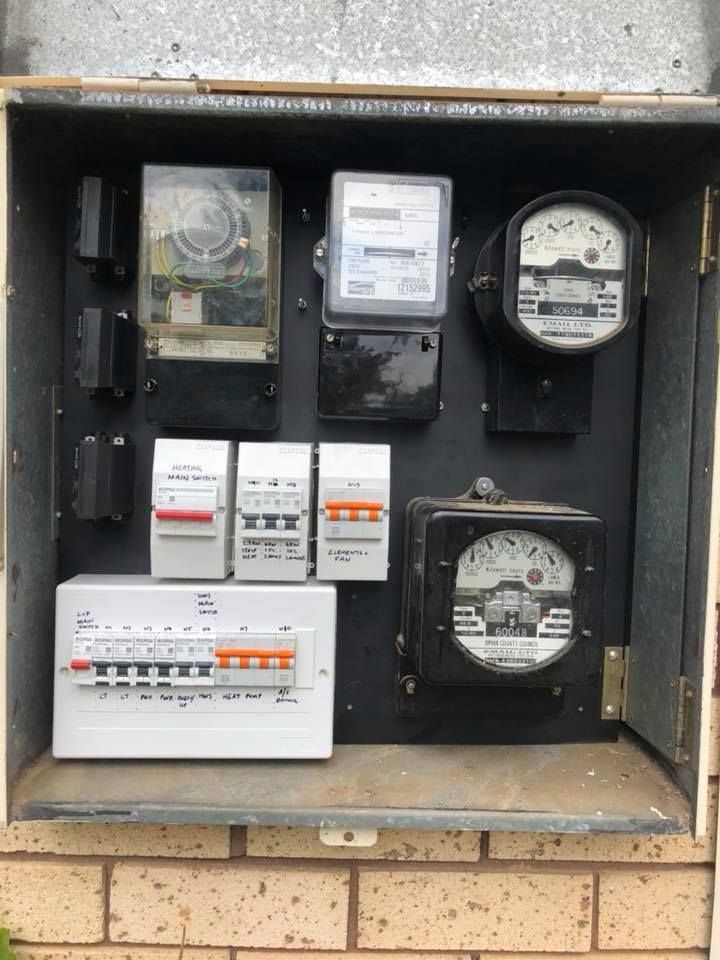 Stylish Electrical Switch Box and Electric Meter — Industrial Electrician in Orange