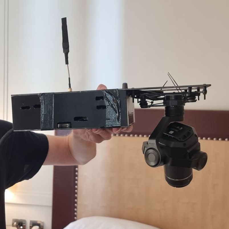 Handheld view of a WarpCam® camera rig.