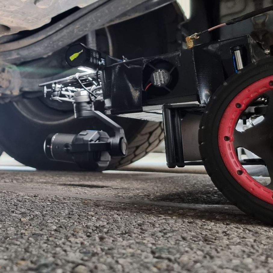 Dynamic shot of WarpCam® mounted on RC car speeding on set