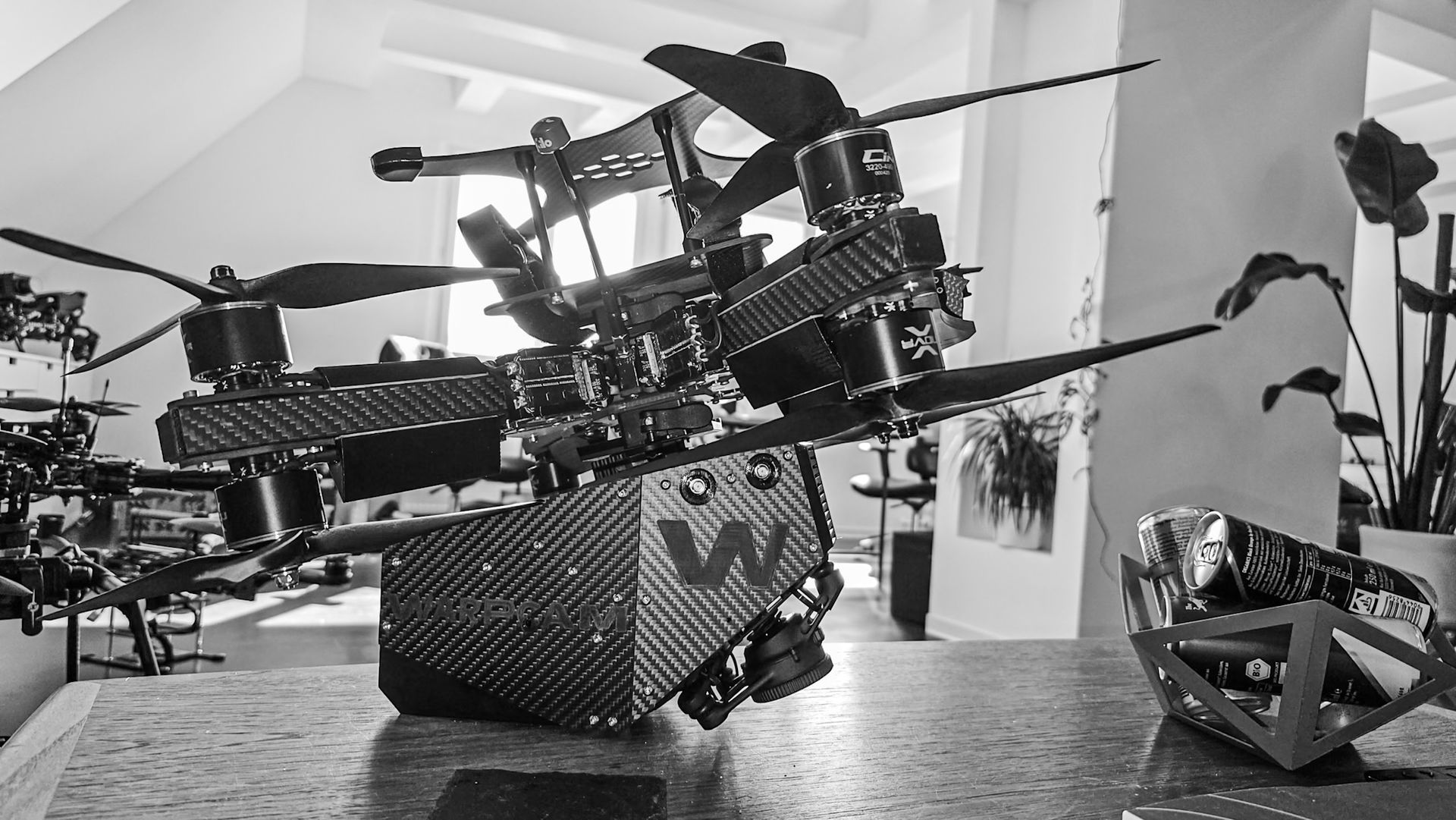 WarpCam® camera mounted on an FPV drone for aerial action filming.