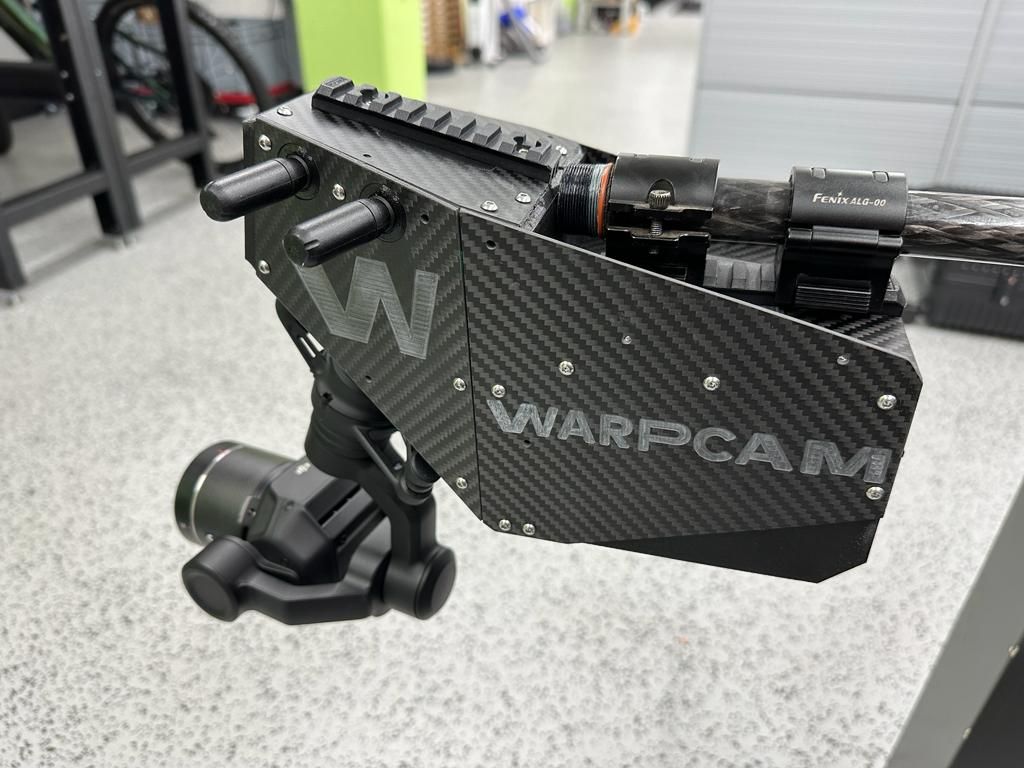 WarpCam® operating on a foggy science-fiction set with colored lighting.