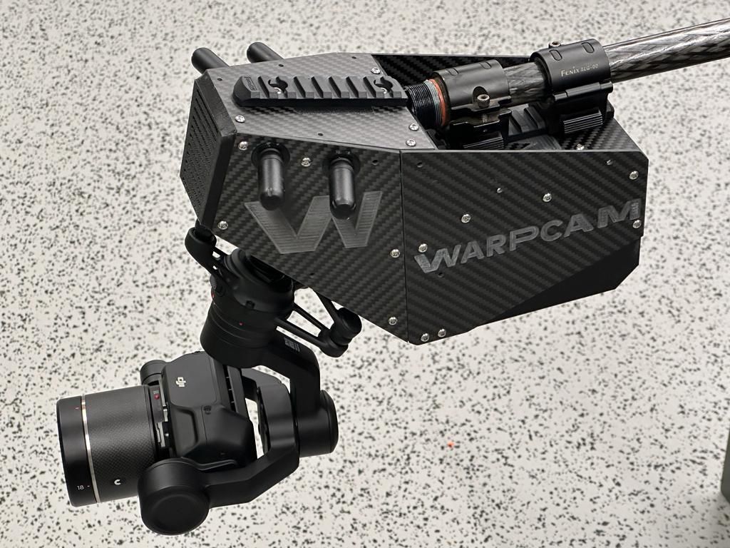 Close-up of WarpCam® lenses and stabilizers on a film set.