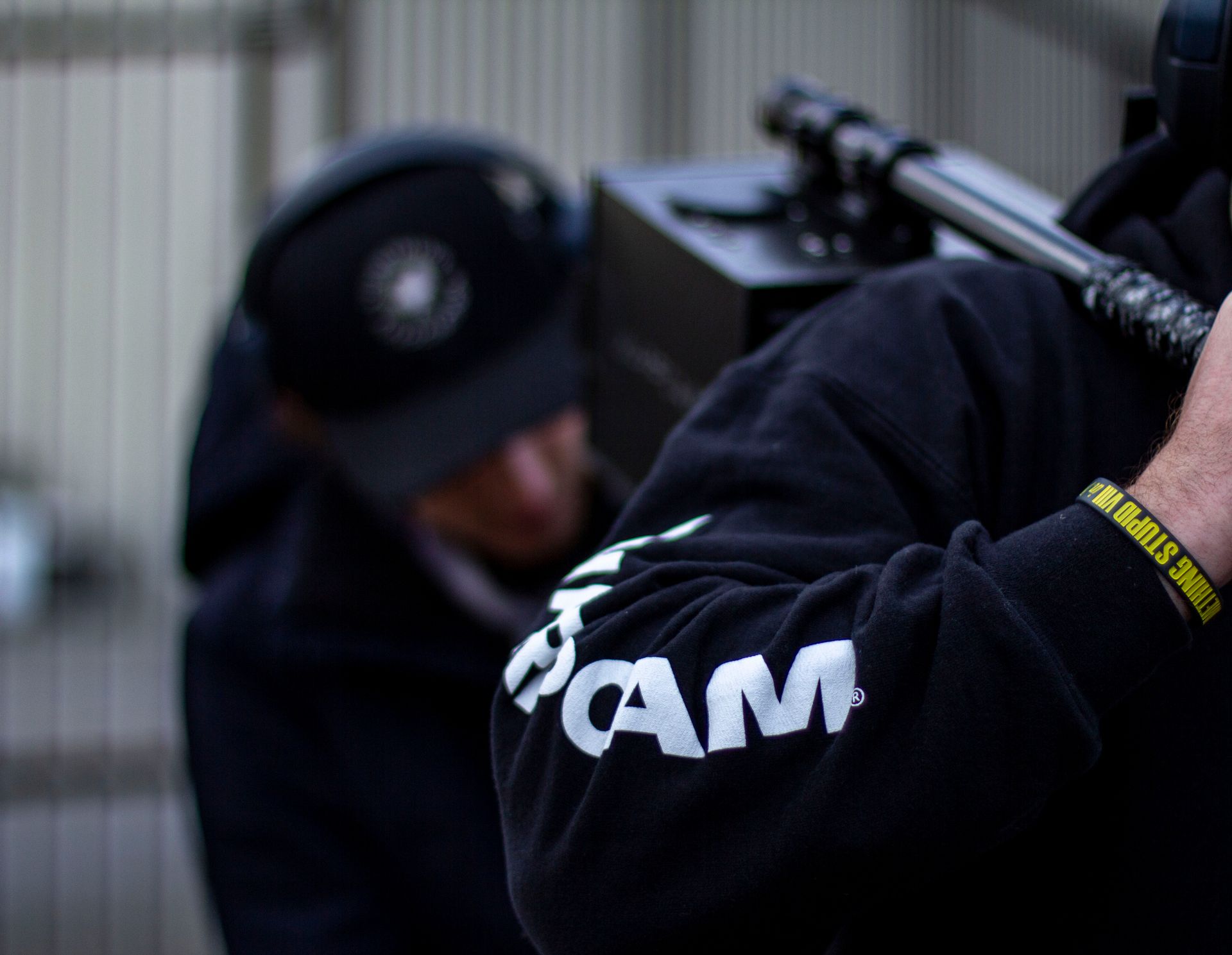 Film operator holding stabilized WarpCam® amidst high-intensity shooting