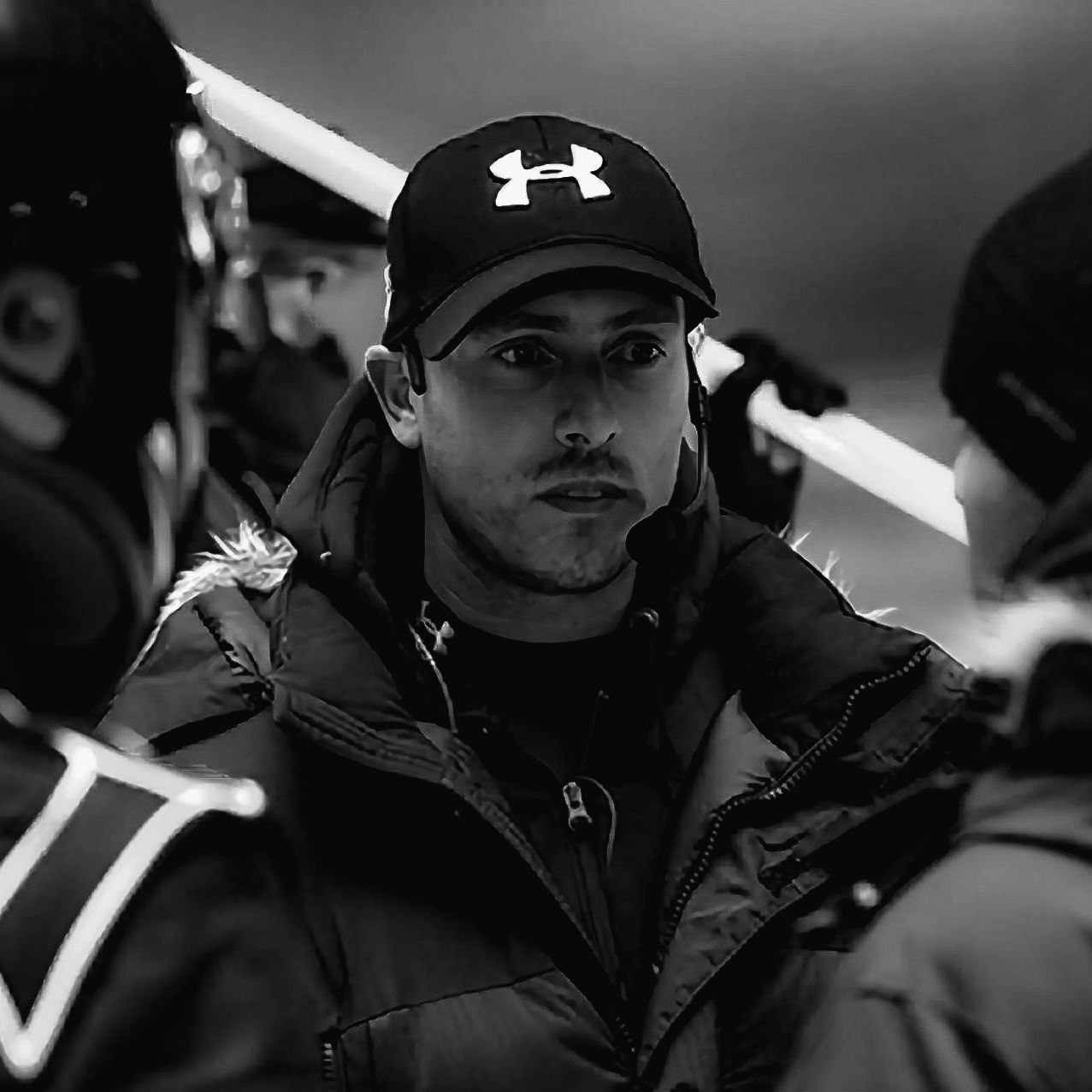 Ferdi Fischer briefing stunt performers and precision drivers on a Dunlop commercial set.