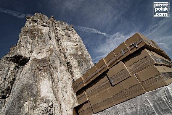 Burgsteinfelsen cliff beside the nearly finished cardboard-box landing area before the 45-meter jump.