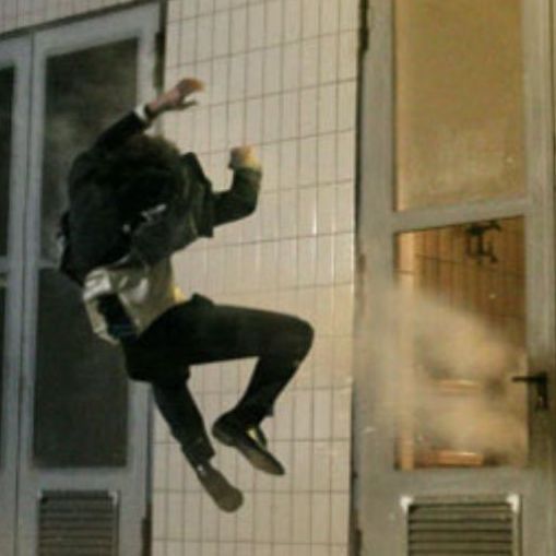 Ferdi Fischer pulled backward by a ratchet system during a stunt setup.