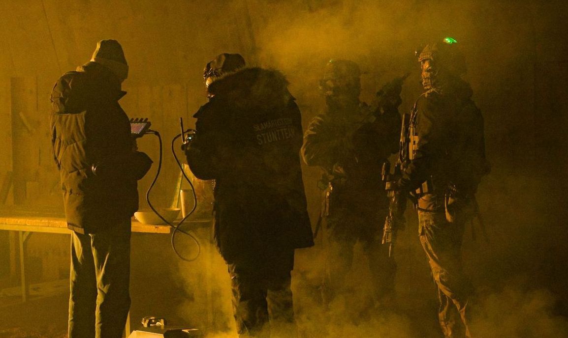 Ferdi Fischer operating WarpCam® beside tactical performers on set.