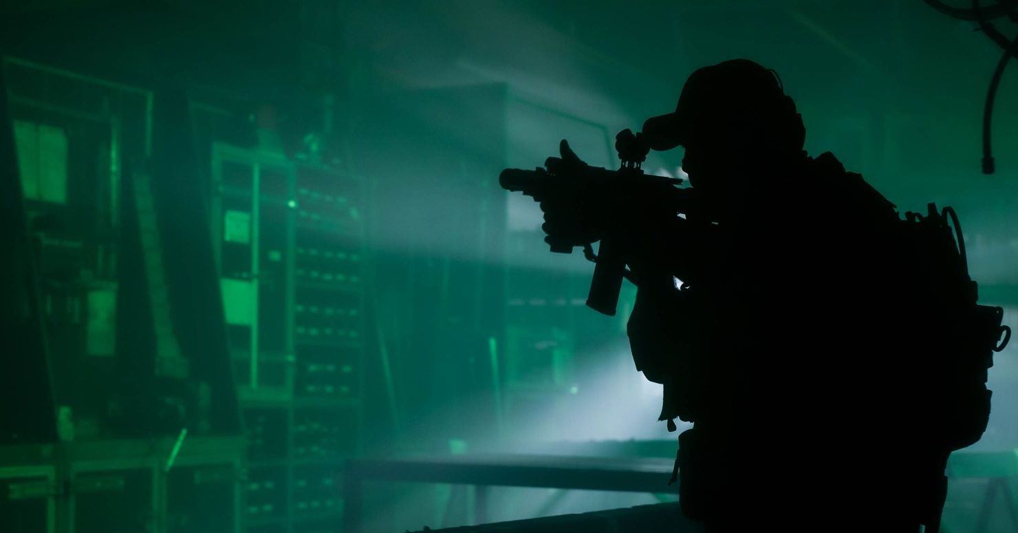 WarpCam® operator filming from the roof of a Humvee.