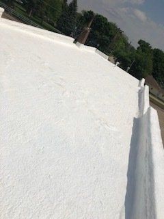 White Painted Roof— Cedar Valley, IA — Raber Roofing Systems LLC.