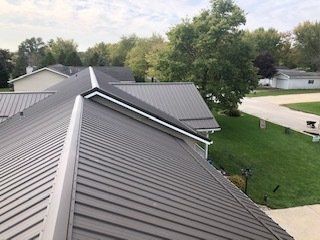 Roof With Trees — Cedar Valley, IA — Raber Roofing Systems LLC.