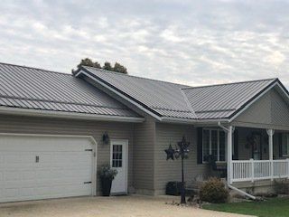 Simple Gray House — Cedar Valley, IA — Raber Roofing Systems LLC.