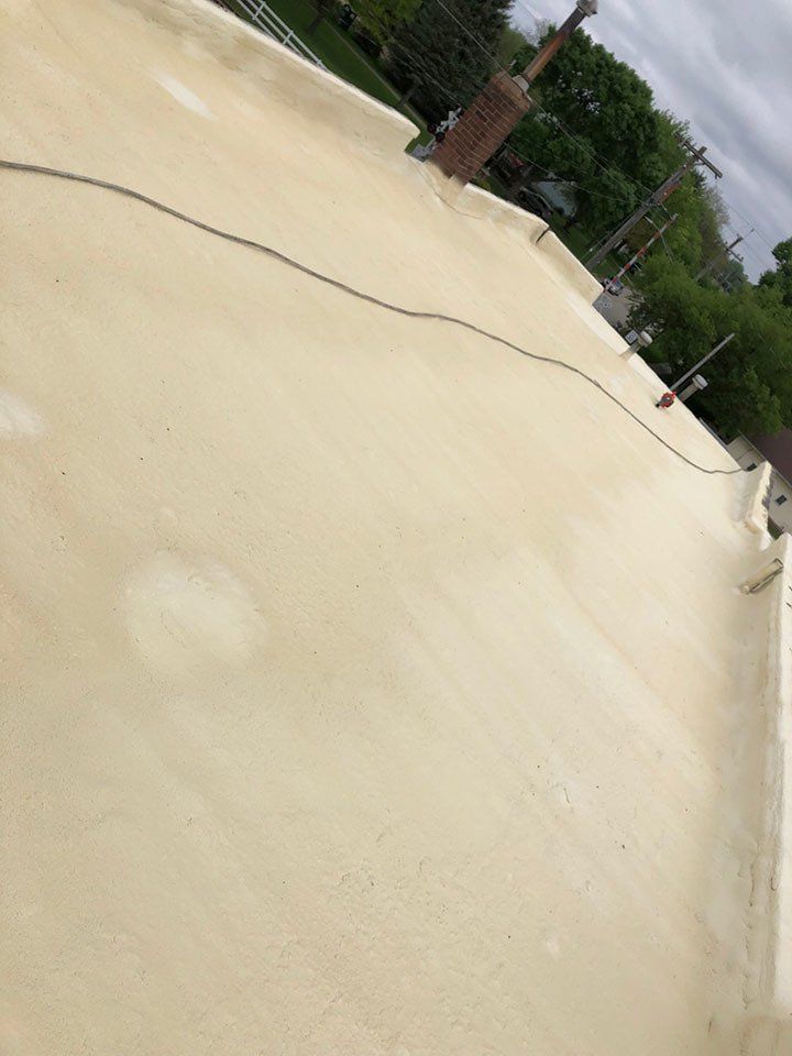 Cream Color Of Roof — Cedar Valley, IA — Raber Roofing Systems LLC.
