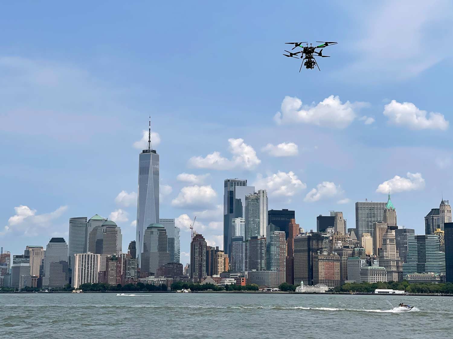 A drone is flying over the new york city skyline