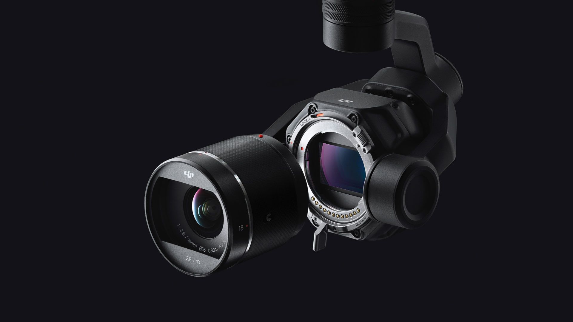A close up of a camera on a black background.