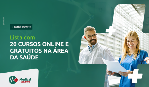 Um médico e uma enfermeira estão olhando para um pedaço de papel.