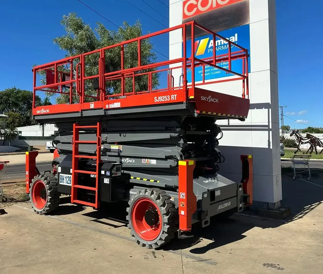Red Scissor Lift With Red Rails and Orange Wheels — Barkly Hire in Dugald River, QLD