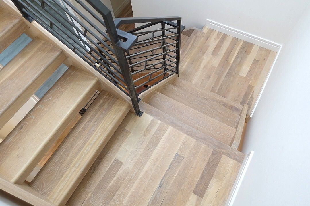 The Custom Stairs Orlando team working on a custom staircase project