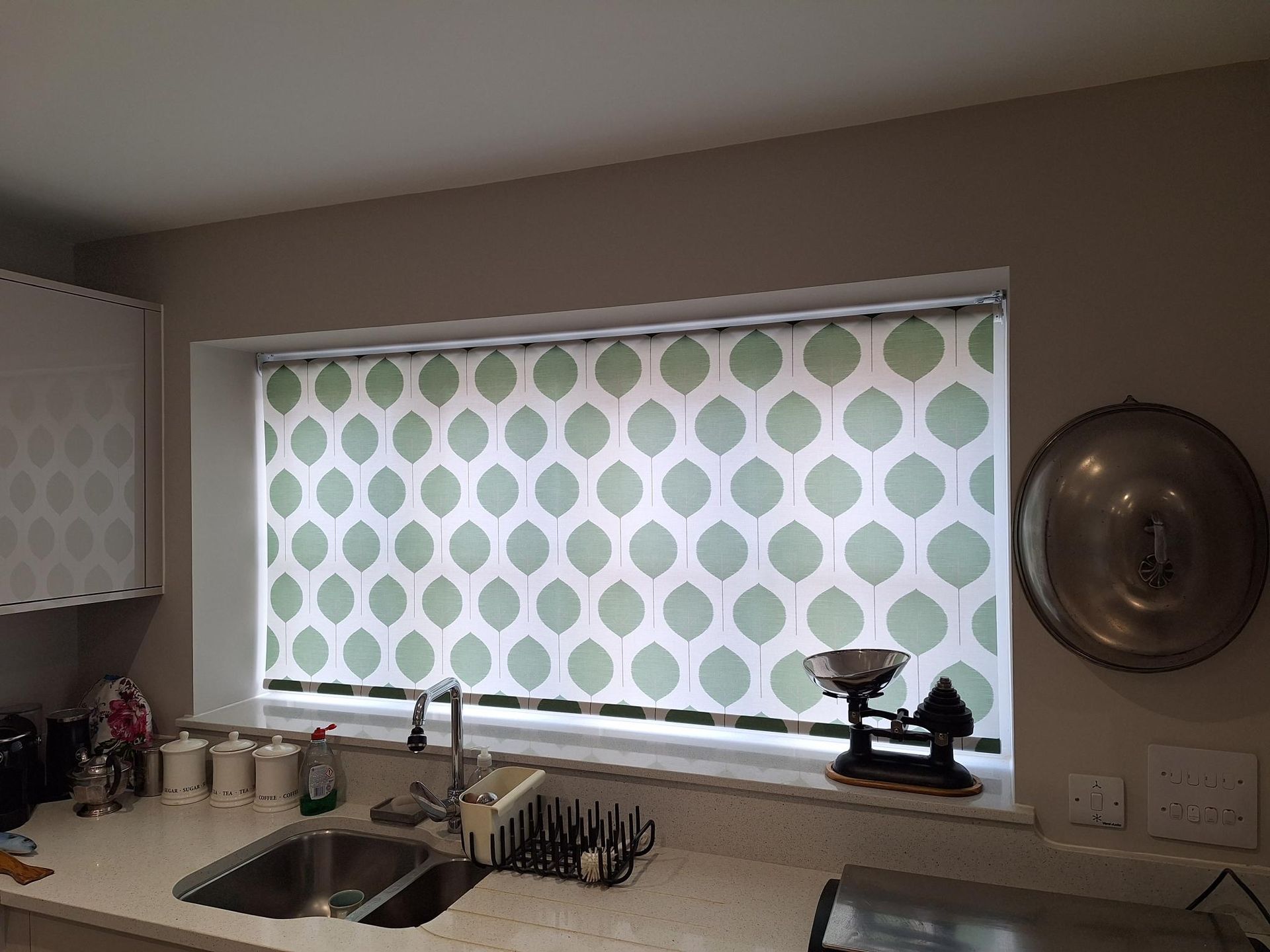 Kitchen with white window blinds