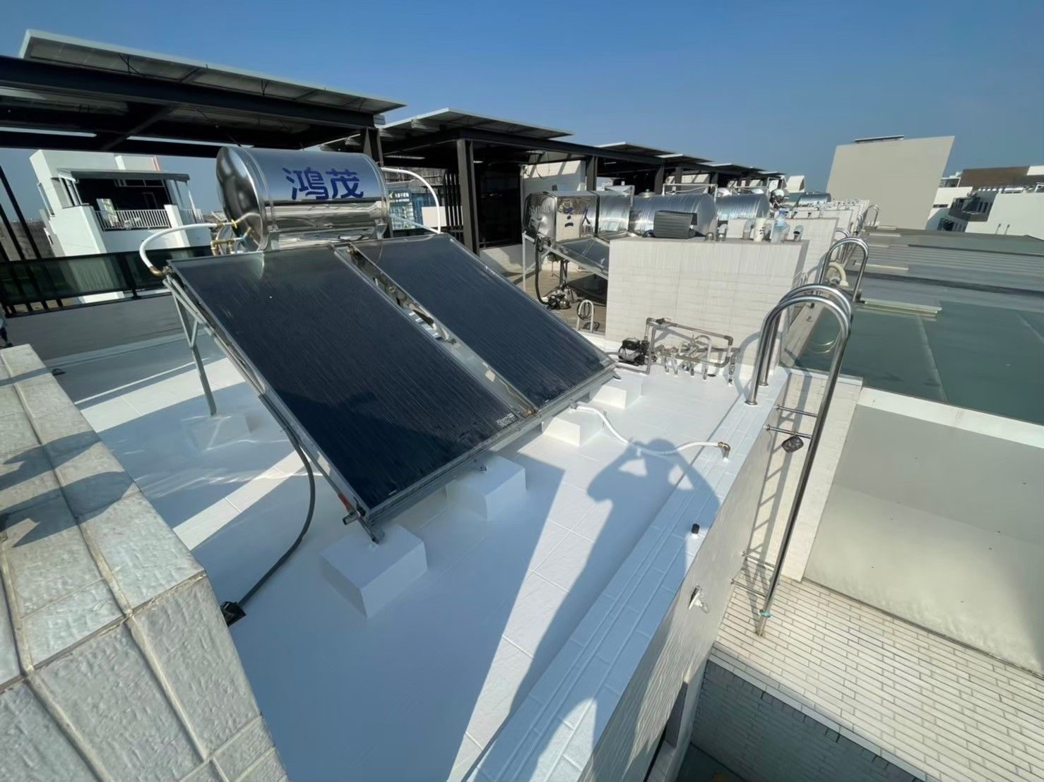 A rooftop with two solar panels on it