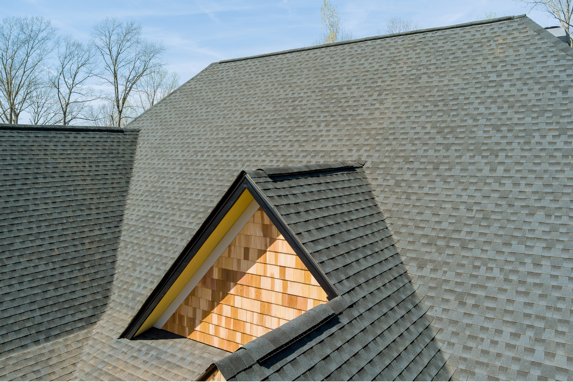A roof with a window in the middle of it