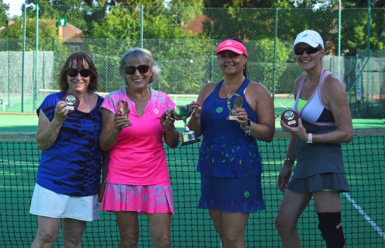 An image of four female tennis players at Pinner Lawn Tennis Club