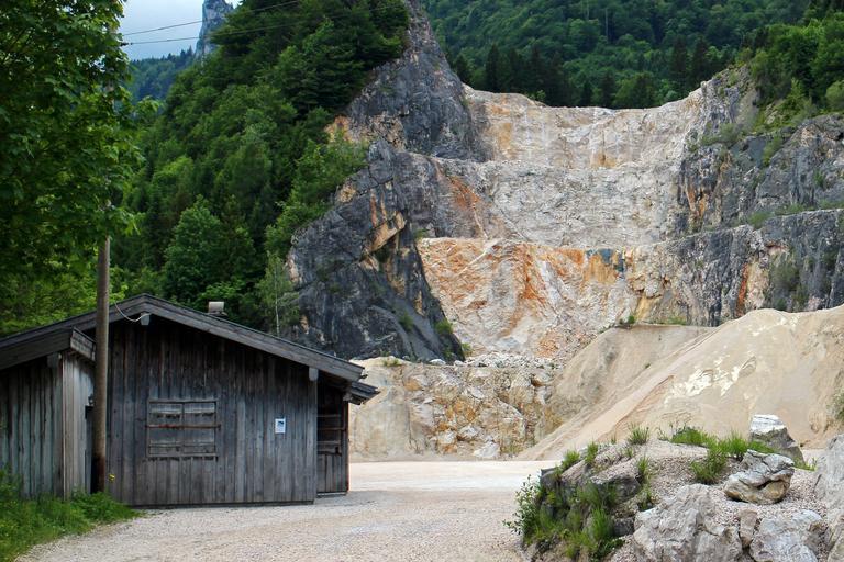 Old Wooden Shed on the left with a staggered cliffside in the background