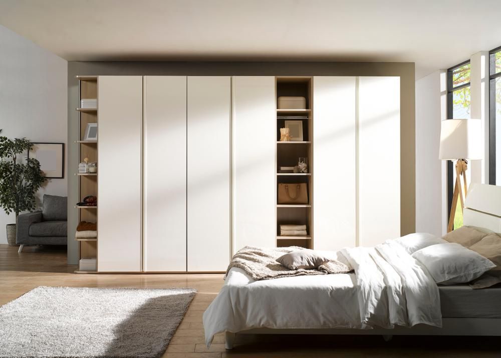 A Bedroom With A Bed And A Large Wardrobe — Viison Kitchens & Joinery Forster In Old Bar, NSW